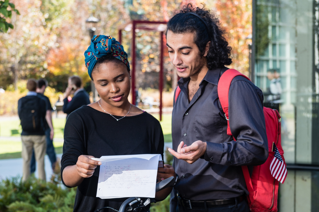 Students looking at a Map