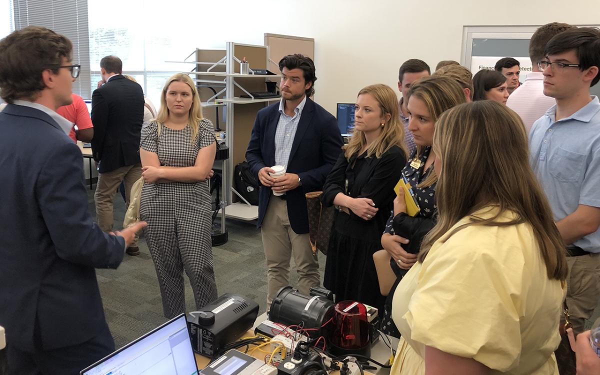 United States congressional staffers listening to a demo in the Cyber-Physical Systems Security Lab (CPSec) during their visit to Georgia Tech on August 31, 2023.